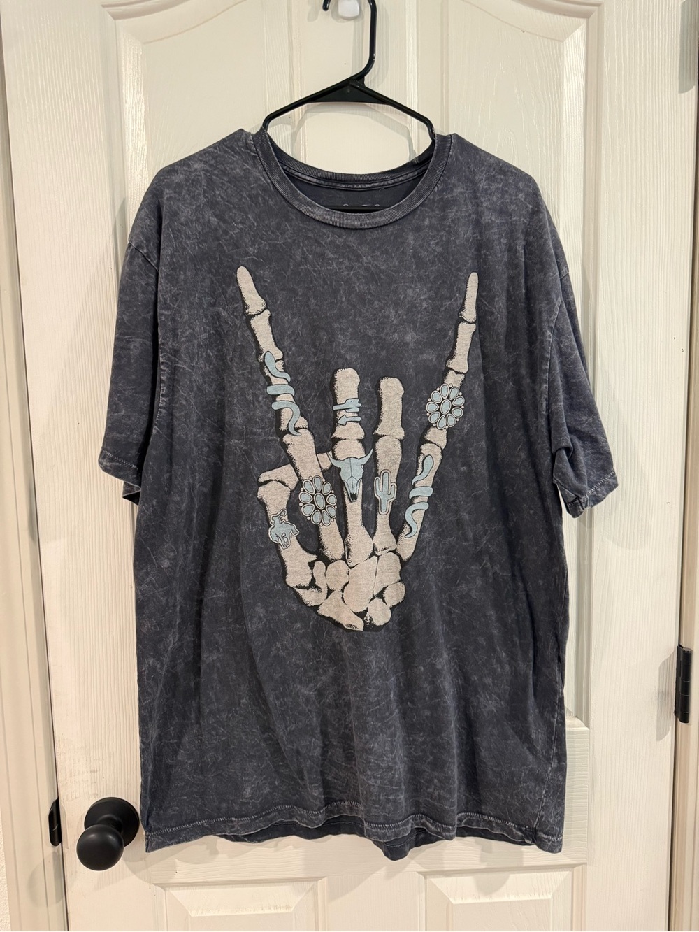 Washed Black Graphic Skeleton Hand Tee with Blue Accents